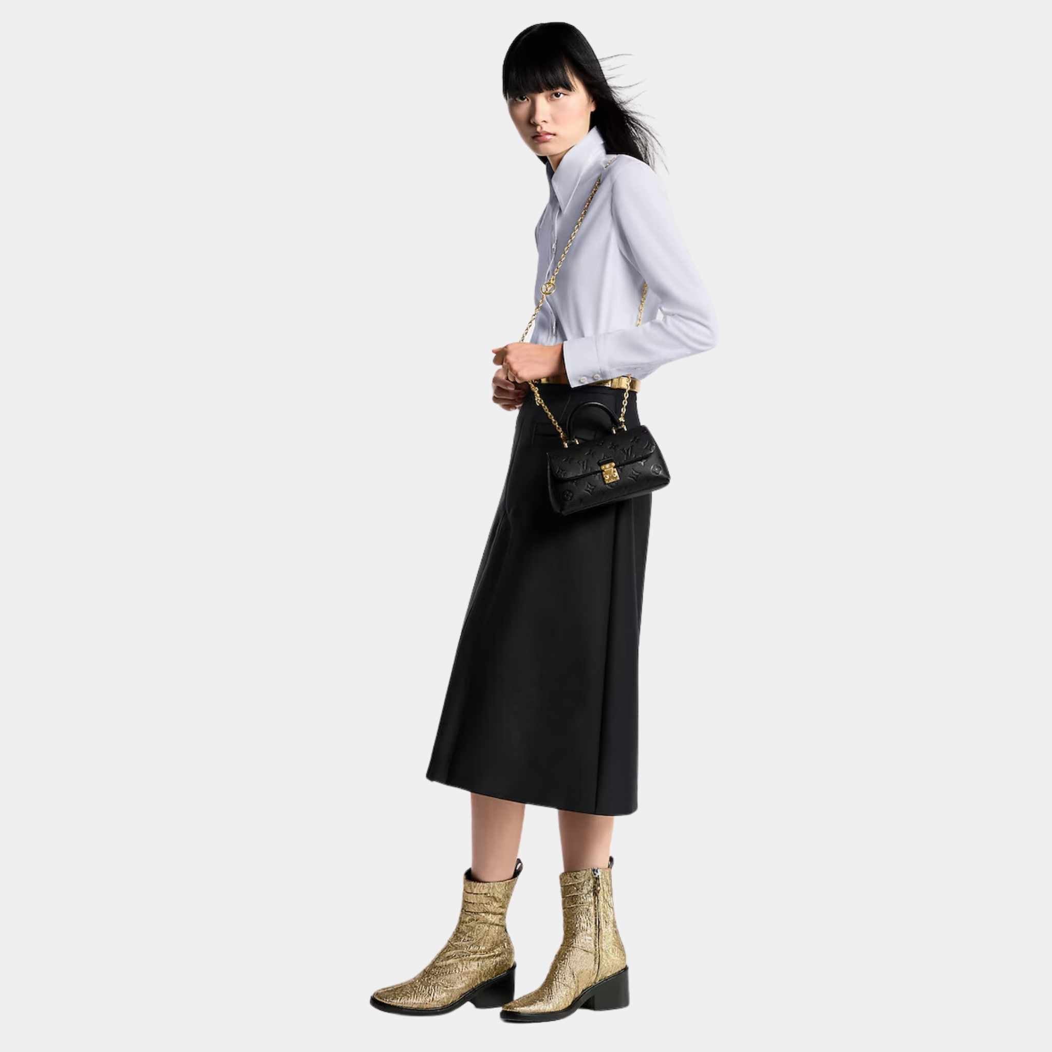Louis Vuitton Nano Madeleine Handbag Monogram Empreinte Leather Black Model View 2