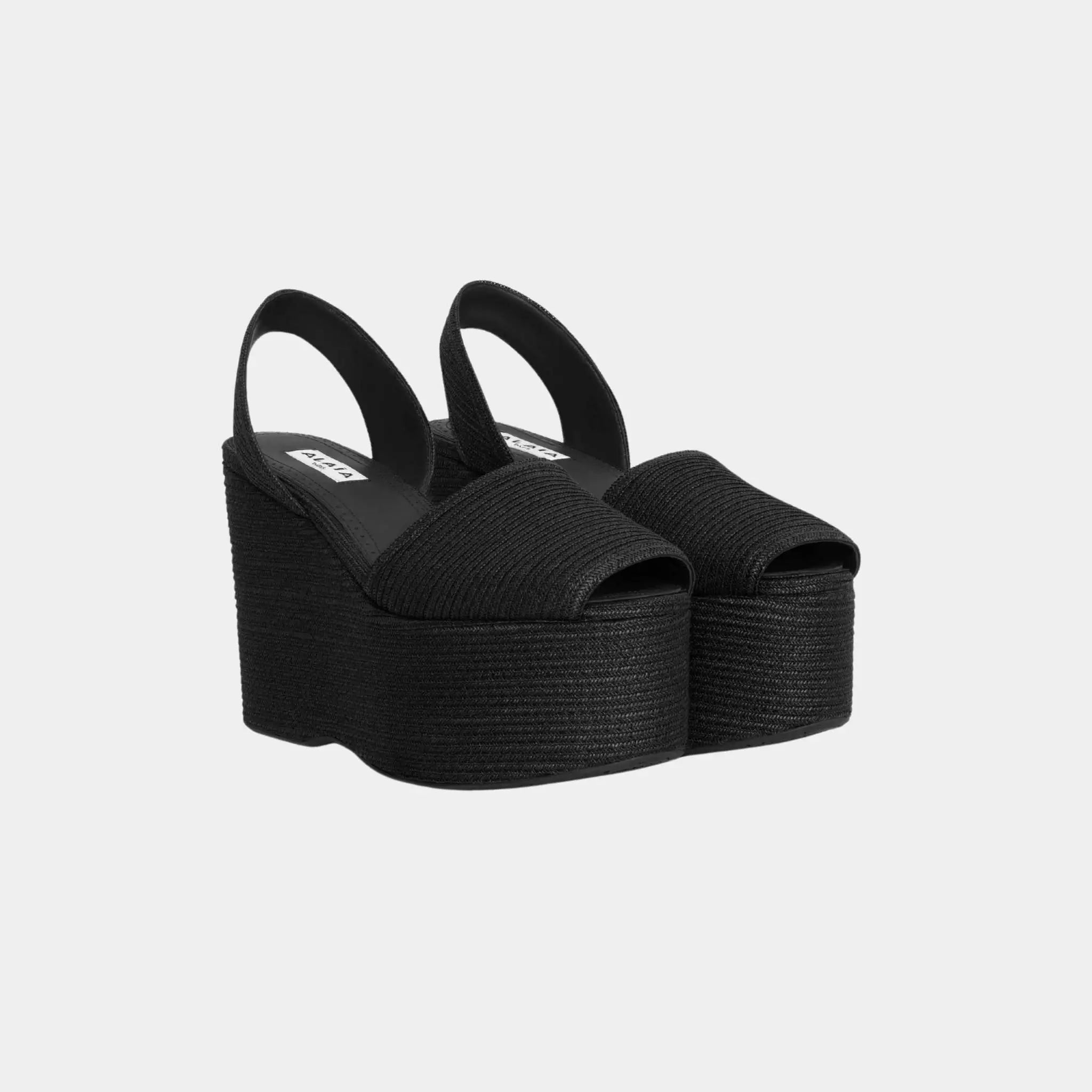 Alaia Wedge Sandals in Paper Straw, Black, Front