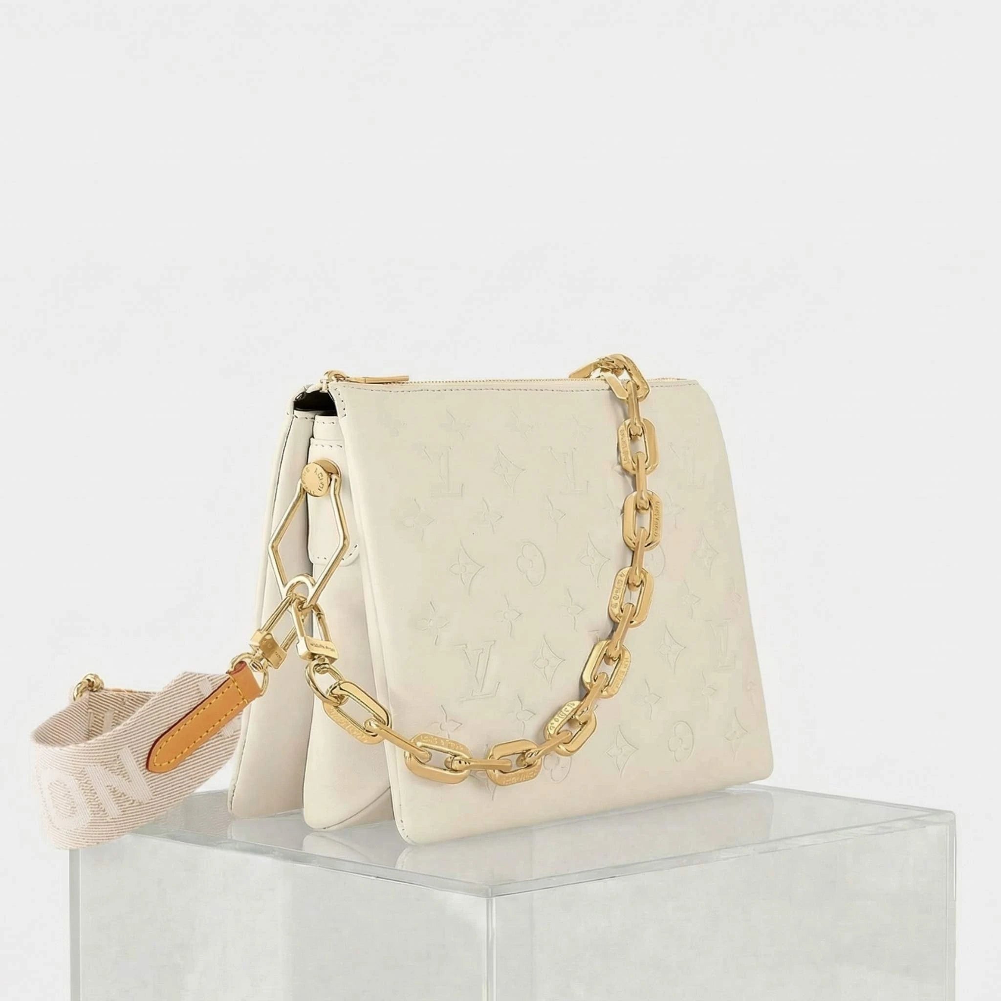 Louis Vuitton Coussin PM Handbag Monogram-embossed Puffy Lambskin, Creme, Side