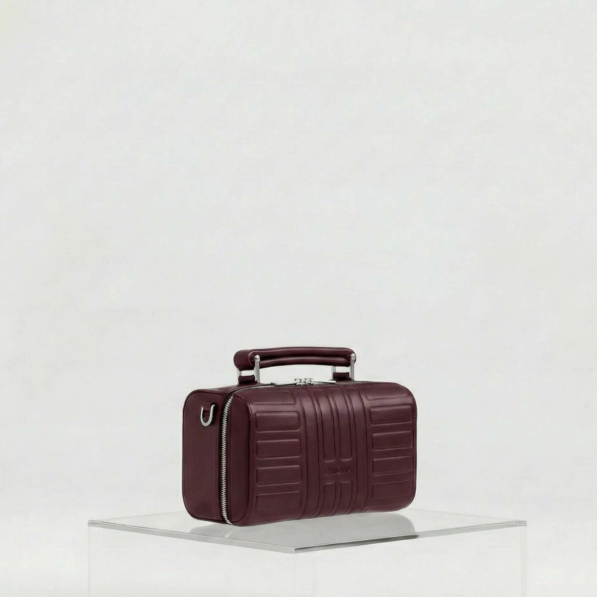Rimowa Groove Leather Cross Body Bag Small, Burgundy, Side, Studio
