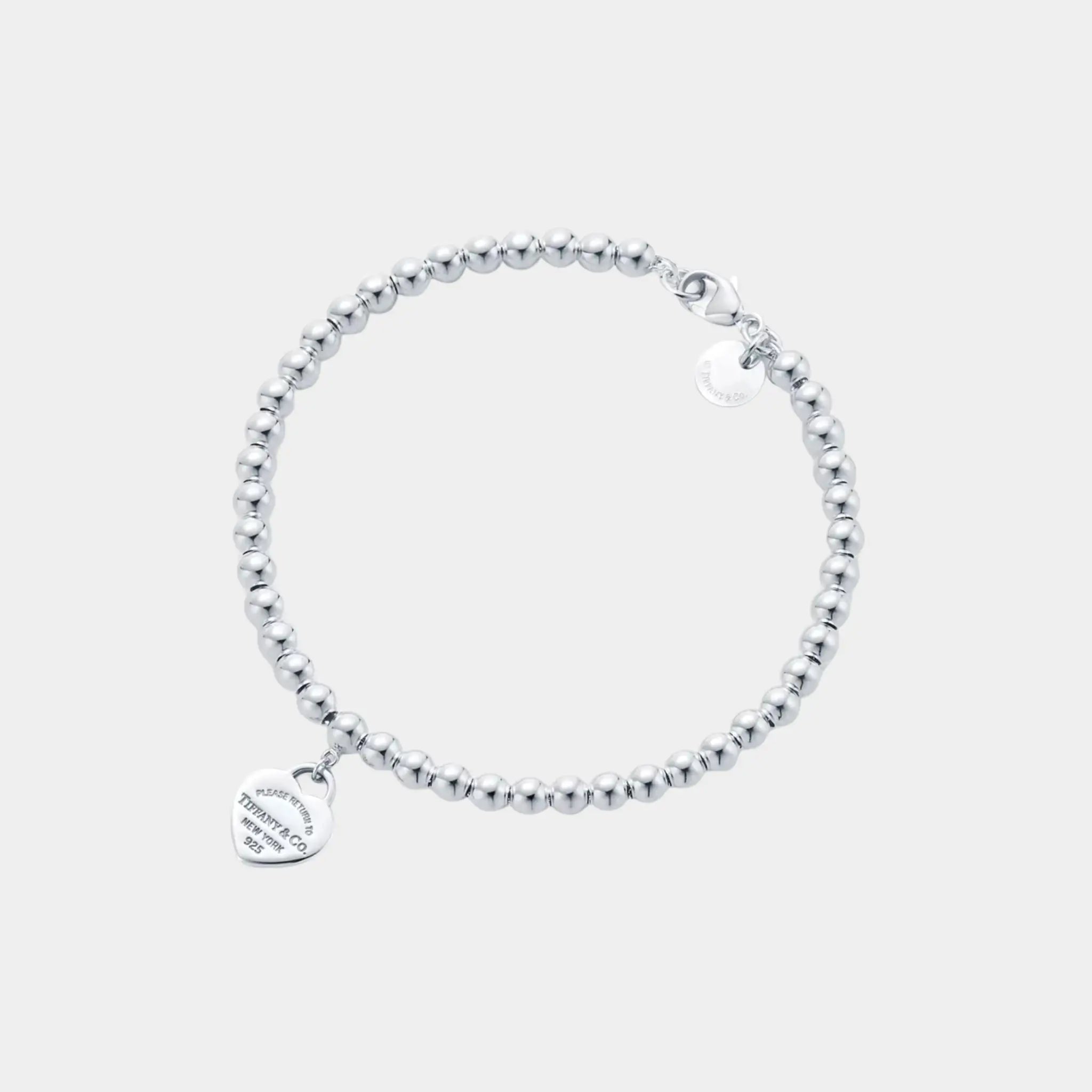 Tiffany & Co Heart-Shaped Pendant In 925 Sterling Silver and Diamond