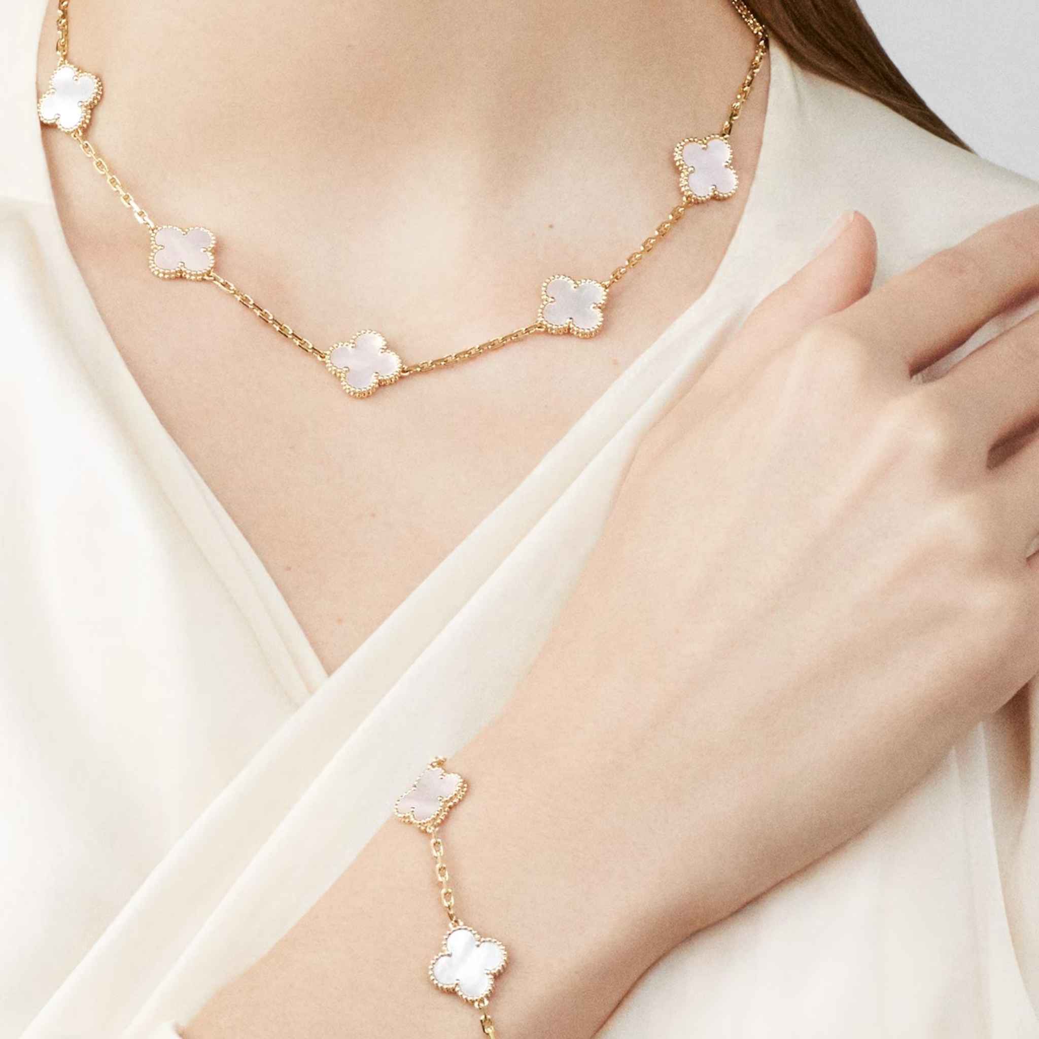 Van Cleef & Arpels Vintage Alhambra Bracelet 5 motifs, Gold with mother of pearl with model