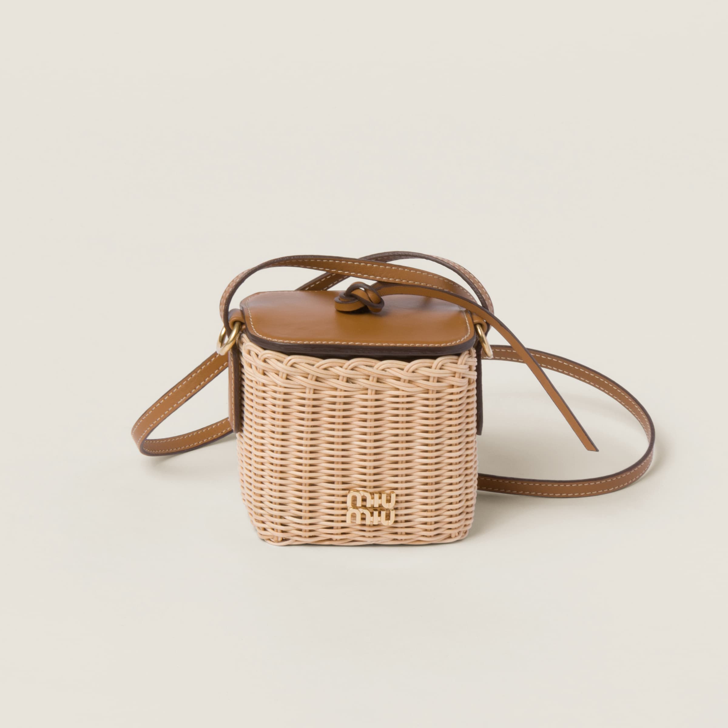 Woven fabric and leather micro-bag