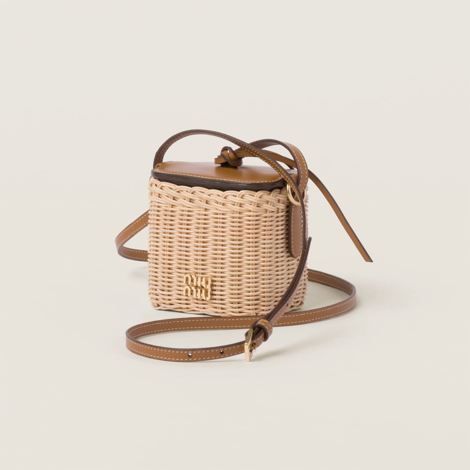 Woven fabric and leather micro-bag