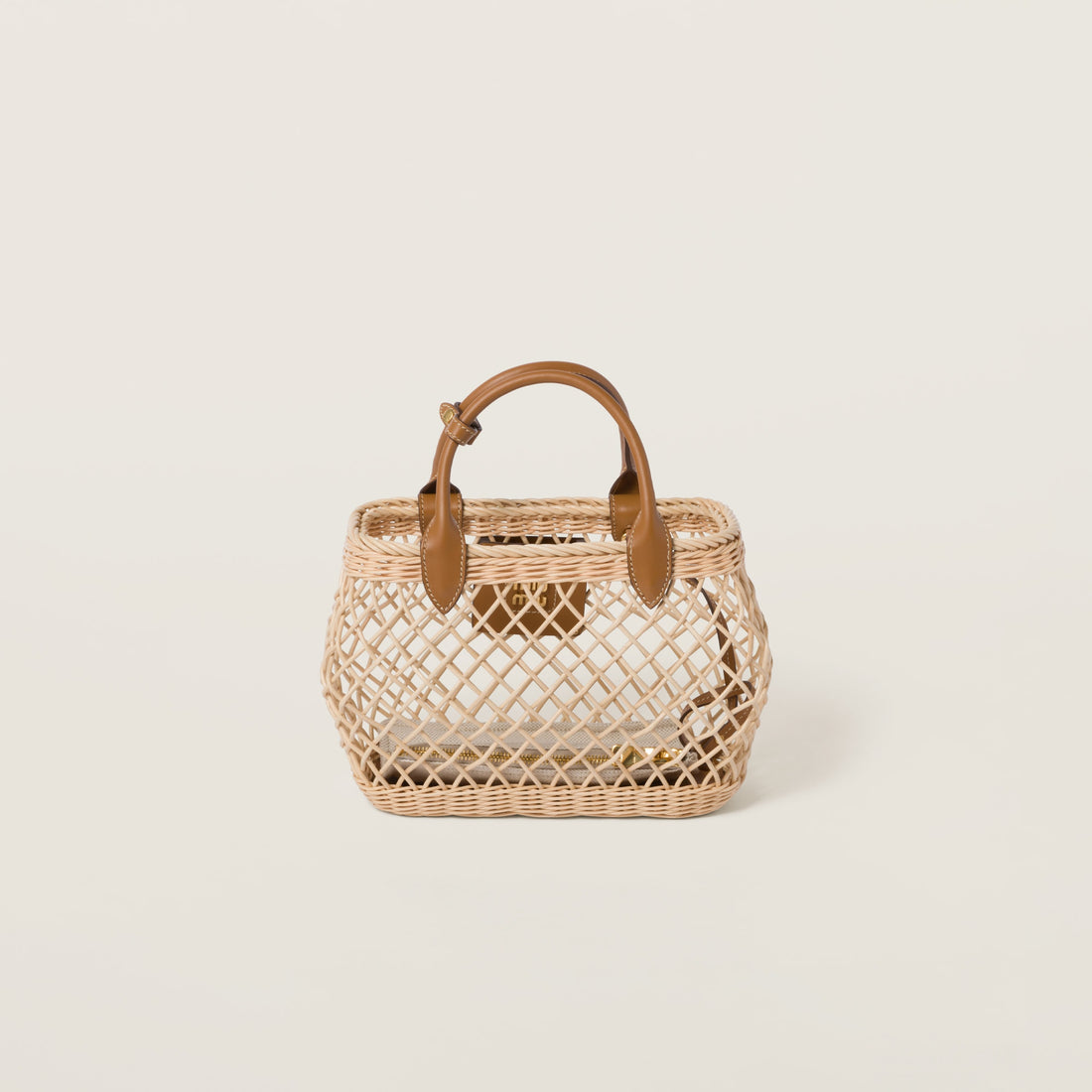 Woven fabric handbag with leather trim