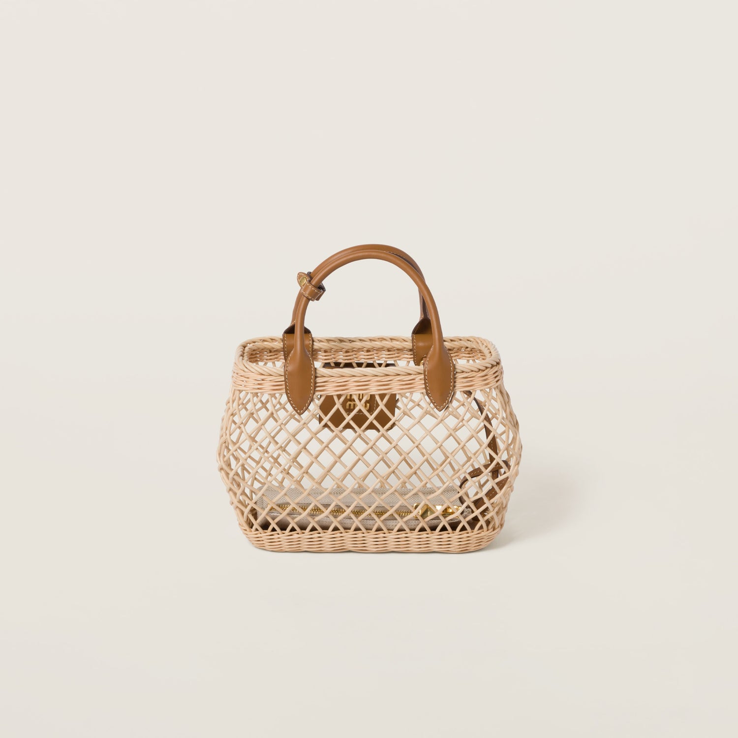 Woven fabric handbag with leather trim