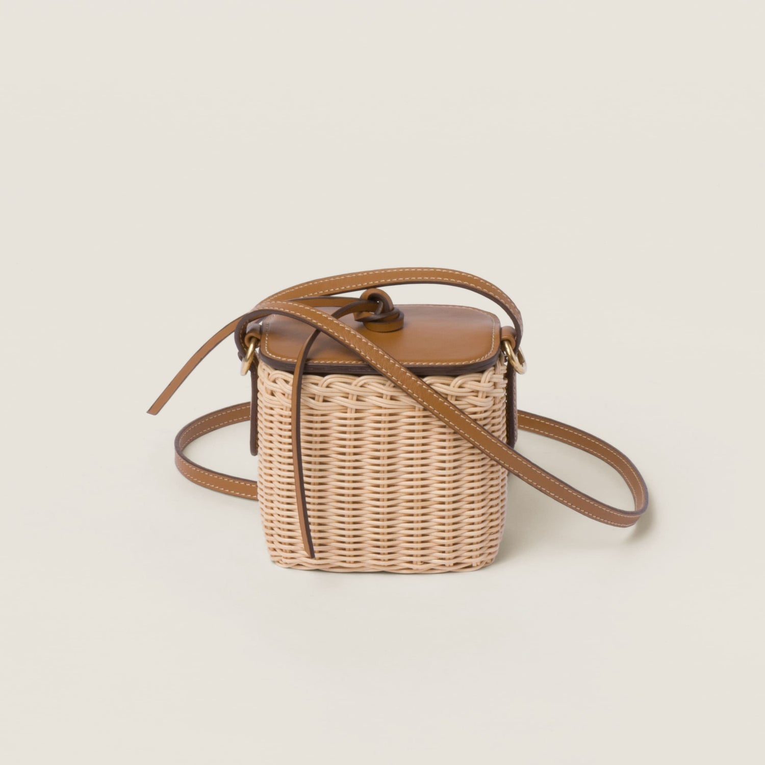 Woven fabric and leather micro-bag