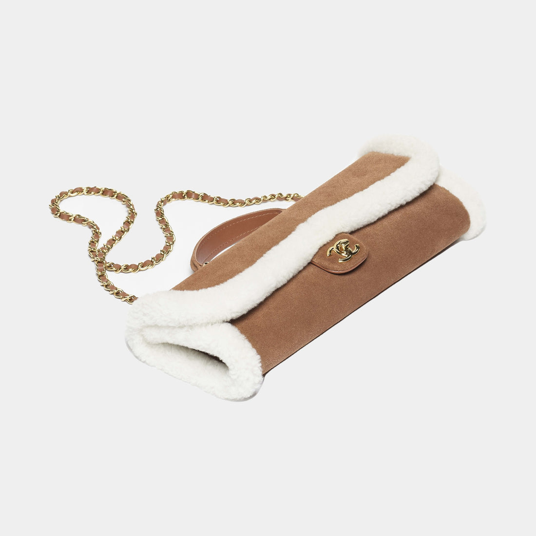 Chanel Clutch with Chain brown suede white shearling Coco Neige 2026 three quarter view