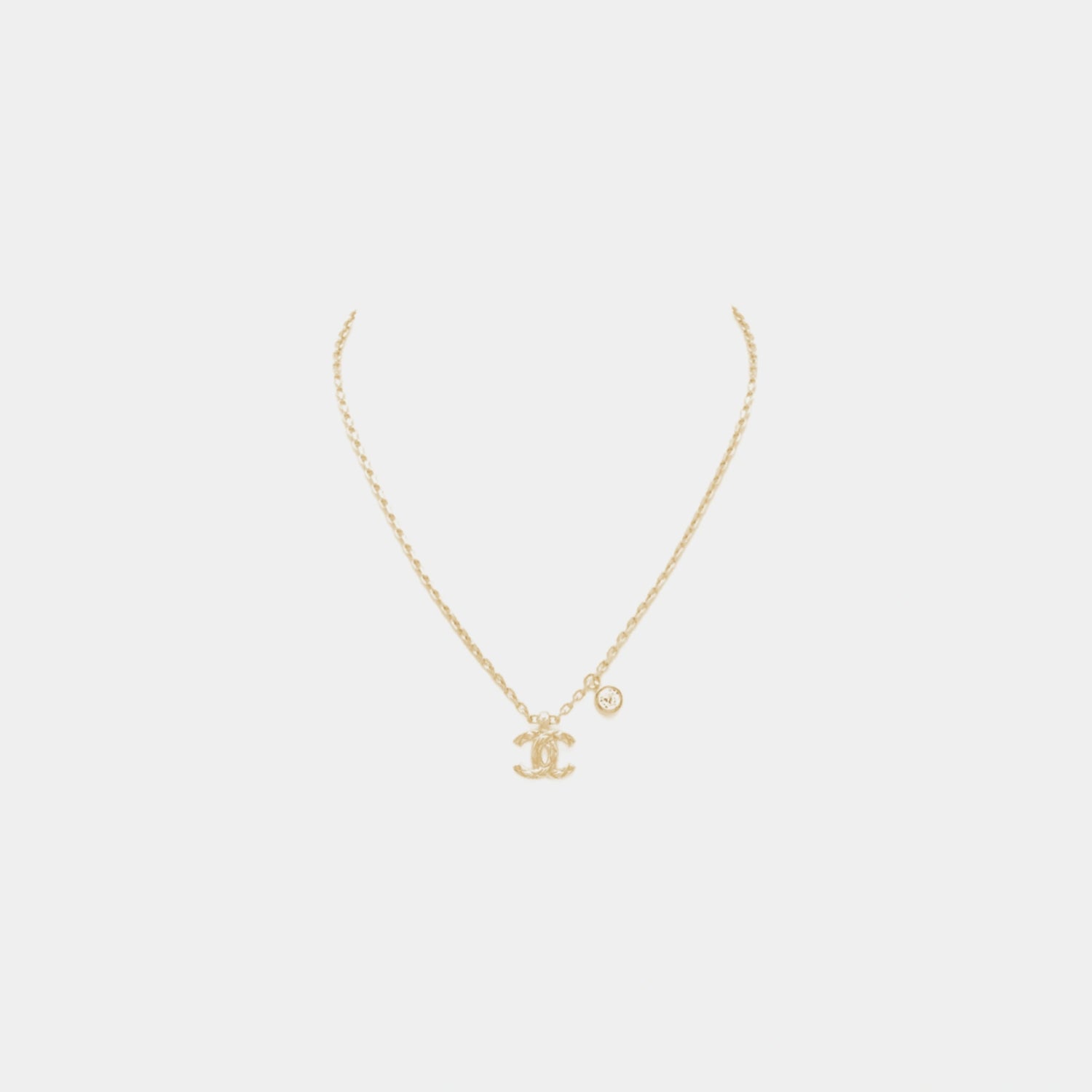 Chanel Gold Metal CC Pendant Necklace with Crystal Accent, Front