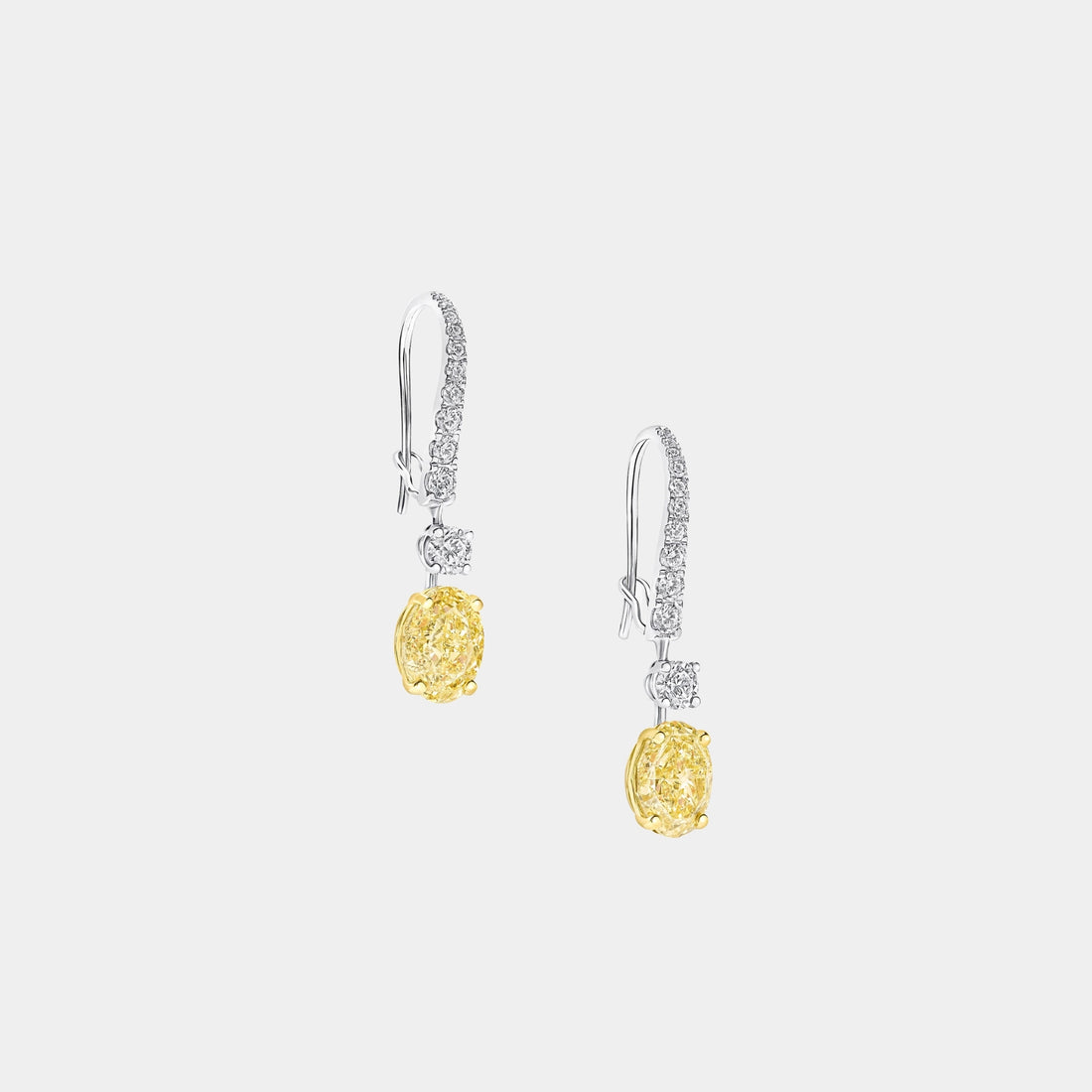 Classic Graff Oval Yellow Diamond Solitaire Earrings, Side