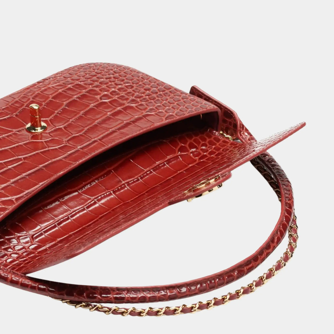 حقيبة كلاتش Chanel بلون خمري من جلد عجل بنقشة التمساح، من الأعلى