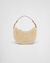 Arqué shearling and leather shoulder bag