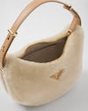 Prada Arqué shearling and leather shoulder bag