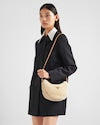 Arqué shearling and leather shoulder bag