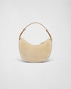 Arqué shearling and leather shoulder bag