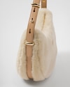 Arqué shearling and leather shoulder bag