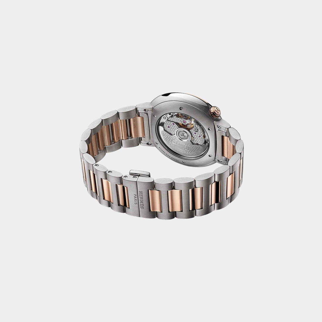 alt
ساعة Hermes Cut مقاس 36 mm مع إطار وسوار من الفولاذ والذهب الوردي، من الخلف