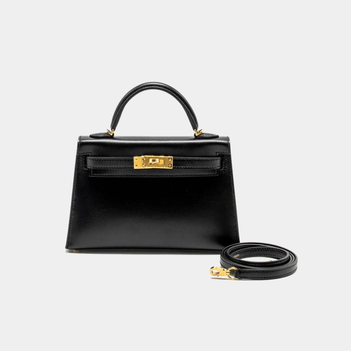 حقيبة Kelly Mini من جلد Box باللون الأسود مع إكسسوارات ذهبية