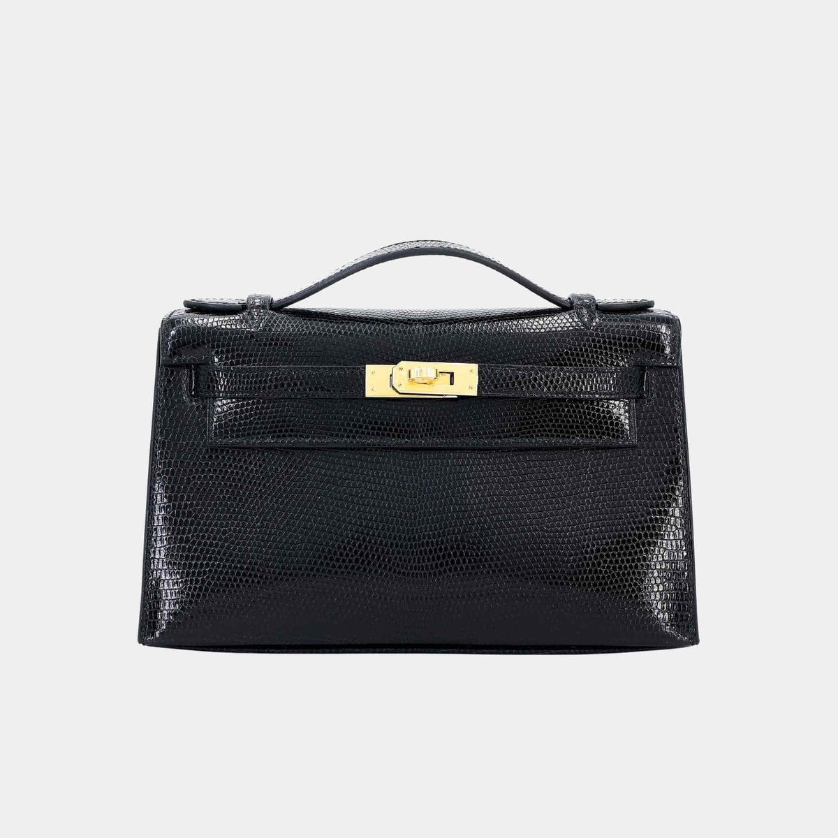 حقيبة Kelly Pochette من سحلية سوداء مع حليات ذهبية