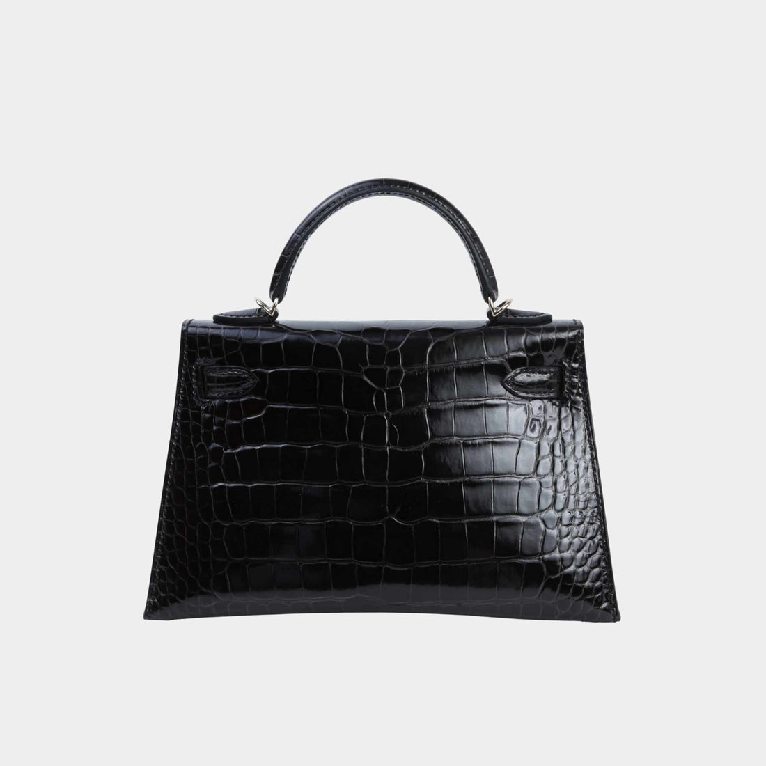 alt
Hermes Mini Kelly II Shiny Alligator Graphite PBHW، الخلفية