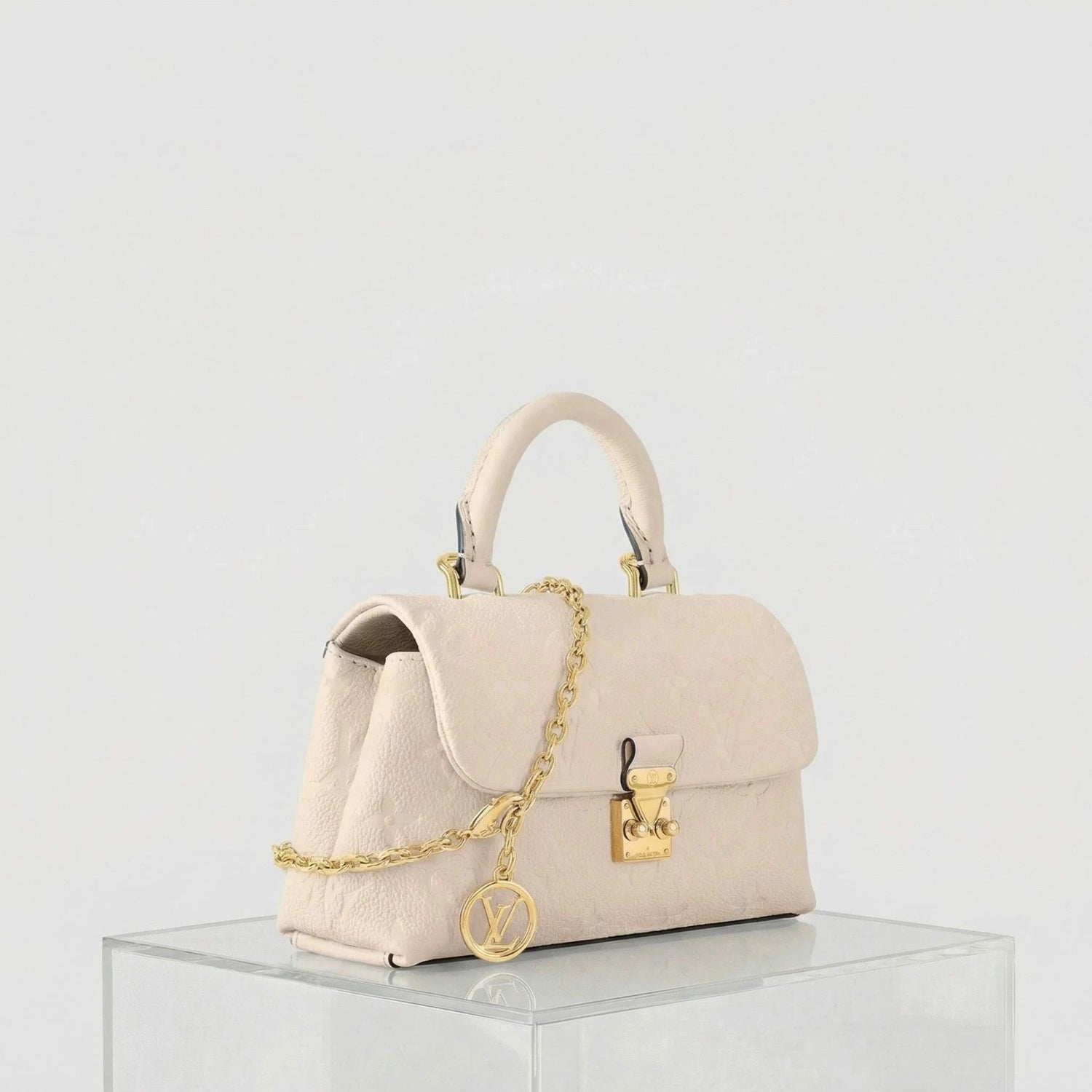 Louis Vuitton Nano Madeleine Handbag Monogram Empreinte Leather, Cream, Side
