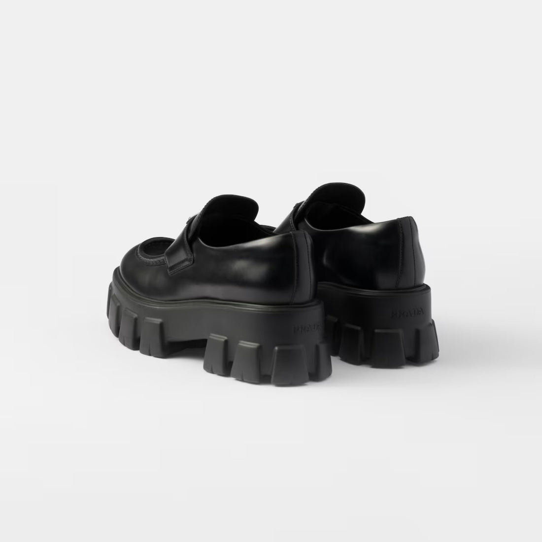 حذاء لوفر Monolith من Prada بجلد مصقول، أسود، من الخلف
