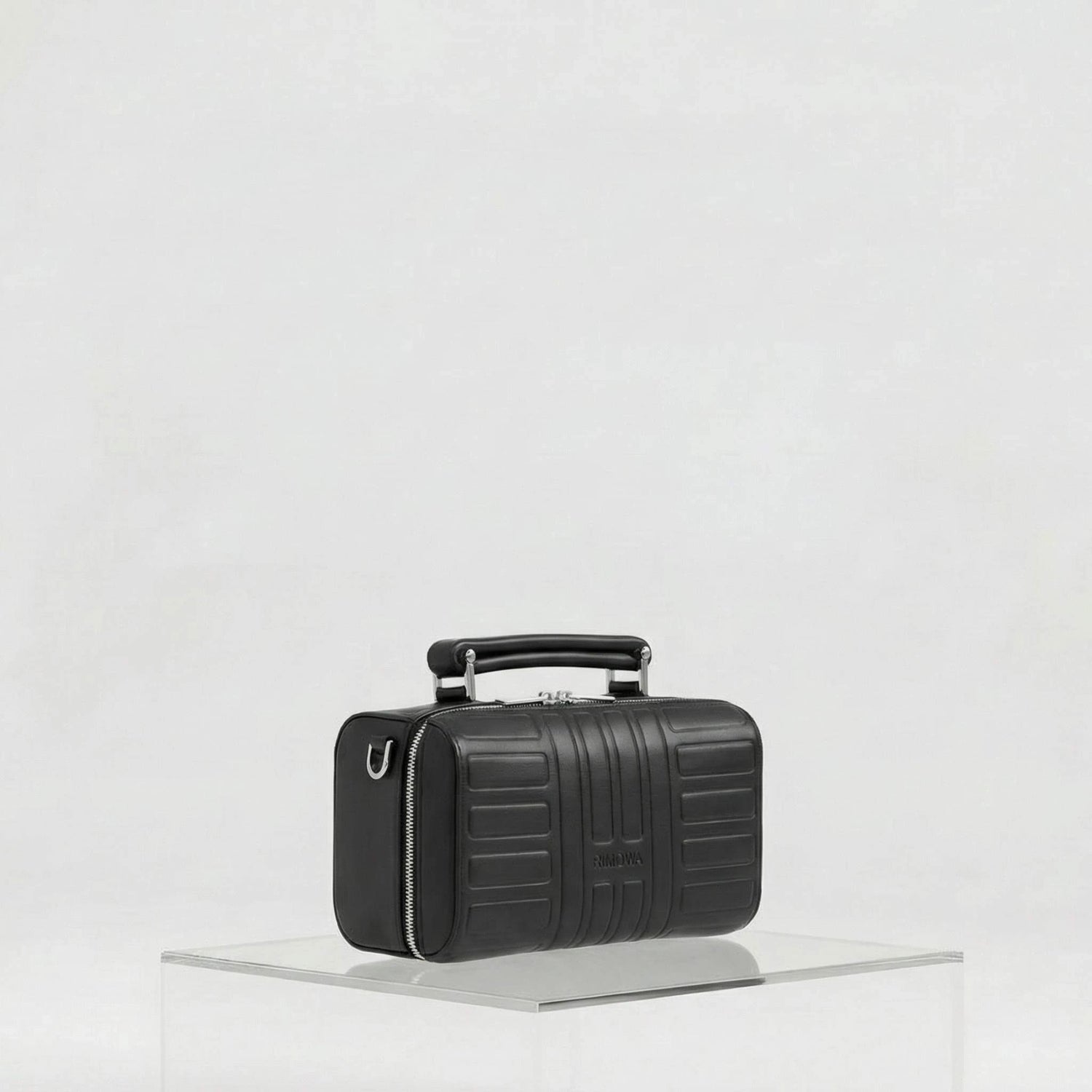 Rimowa Groove Leather Cross Body Bag Small, Black, Side, Studio