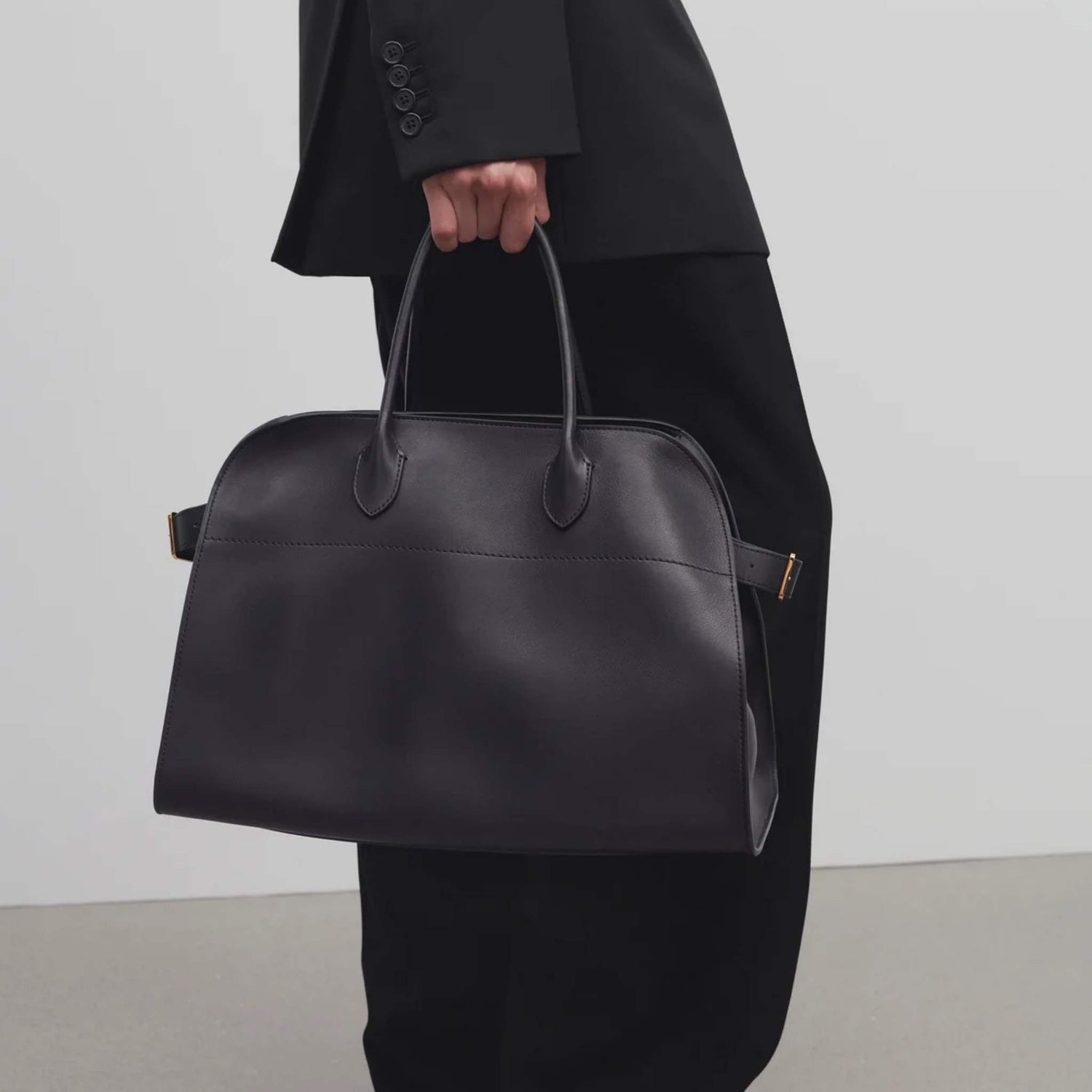 The Row Soft Margaux 17 Bag In Leather Black, Model