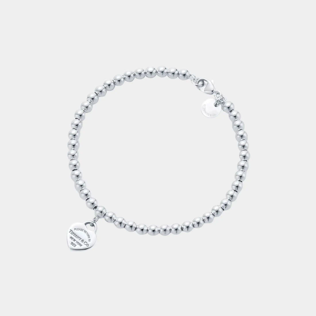 Tiffany & Co Heart-Shaped Pendant In 925 Sterling Silver and Diamond