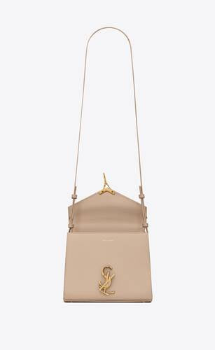 Cassandra Mini Top Handle Bag In Grain De Poudre Embossed Leather