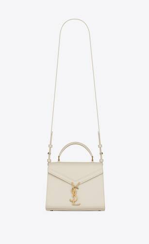 Cassandra Mini Top Handle Bag In Grain De Poudre Embossed Leather